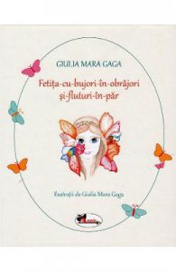 Fetita cu bujori in obrajori si fluturi in par
