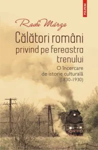 Calatori romani privind pe fereastra trenului