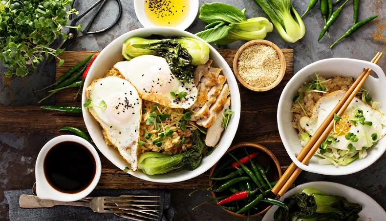 SOY SAUCE, FORK, CHOPSTICKS, POACHED EGG, SPROUTS