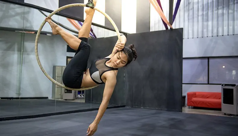 AERIALIST, MIRROR, COUCH, TANK TOP, AERIAL HOOP