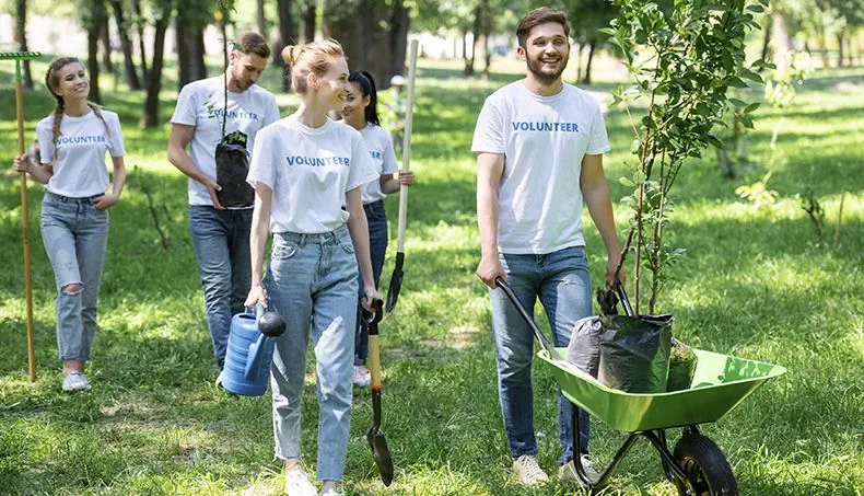 VOLUNTEER, JEANS, SHOVEL, RAKE, WHEELBARROW