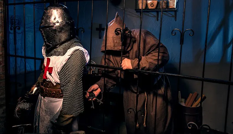 CRUSADER, PRISONER, JAIL, BARS, HOOD