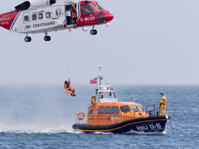 Migrant boat fire in English Channel live: '157 rescued' in coastguard operation